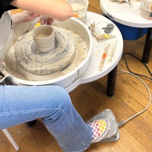 Wednesday Teen Wheel-Throwing